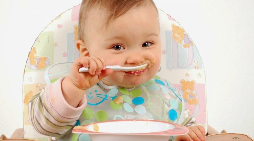 Baby Eating Khichdi2 810x450 1